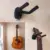 *מתלה קיר לגיטרה – פתרון חכם לאחסון מקצועי* 🎸